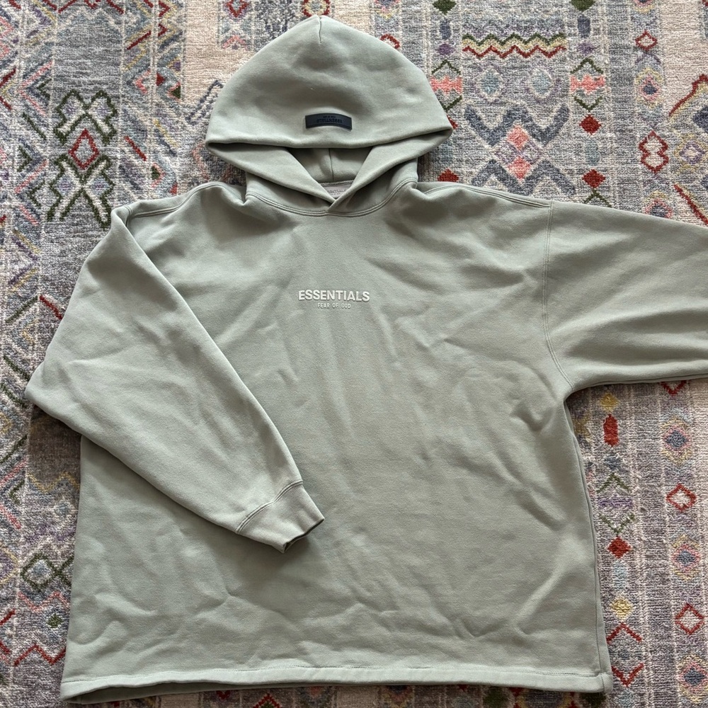 Size large 
Essential hoodie
Seafoam green